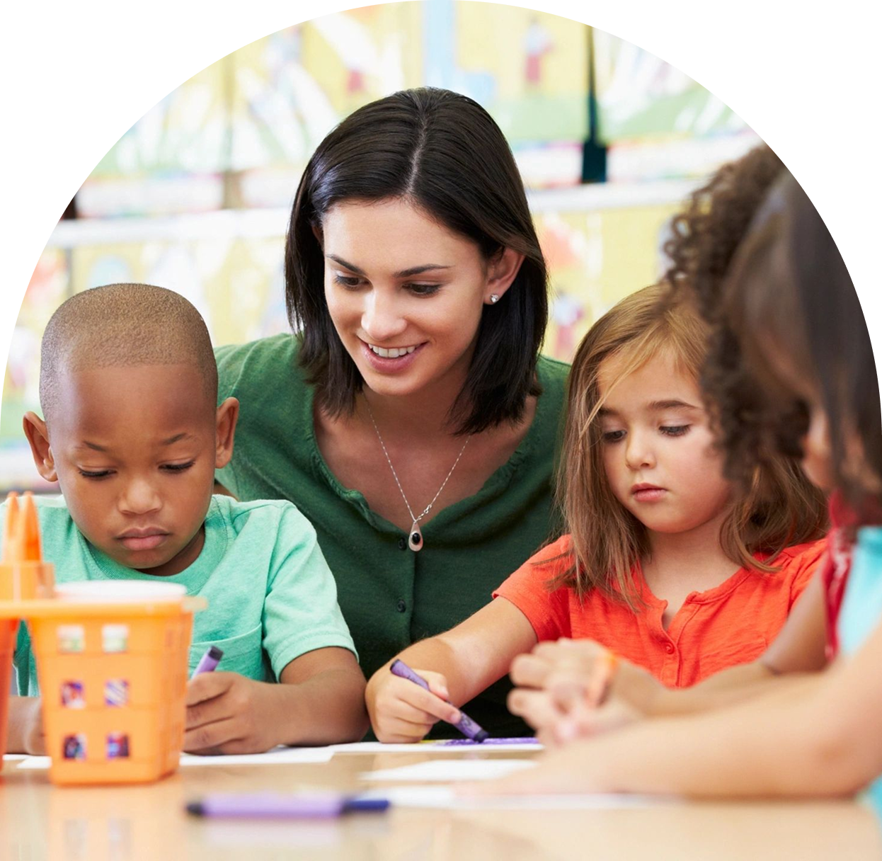 h1-4 A woman is helping children with their crafts.
