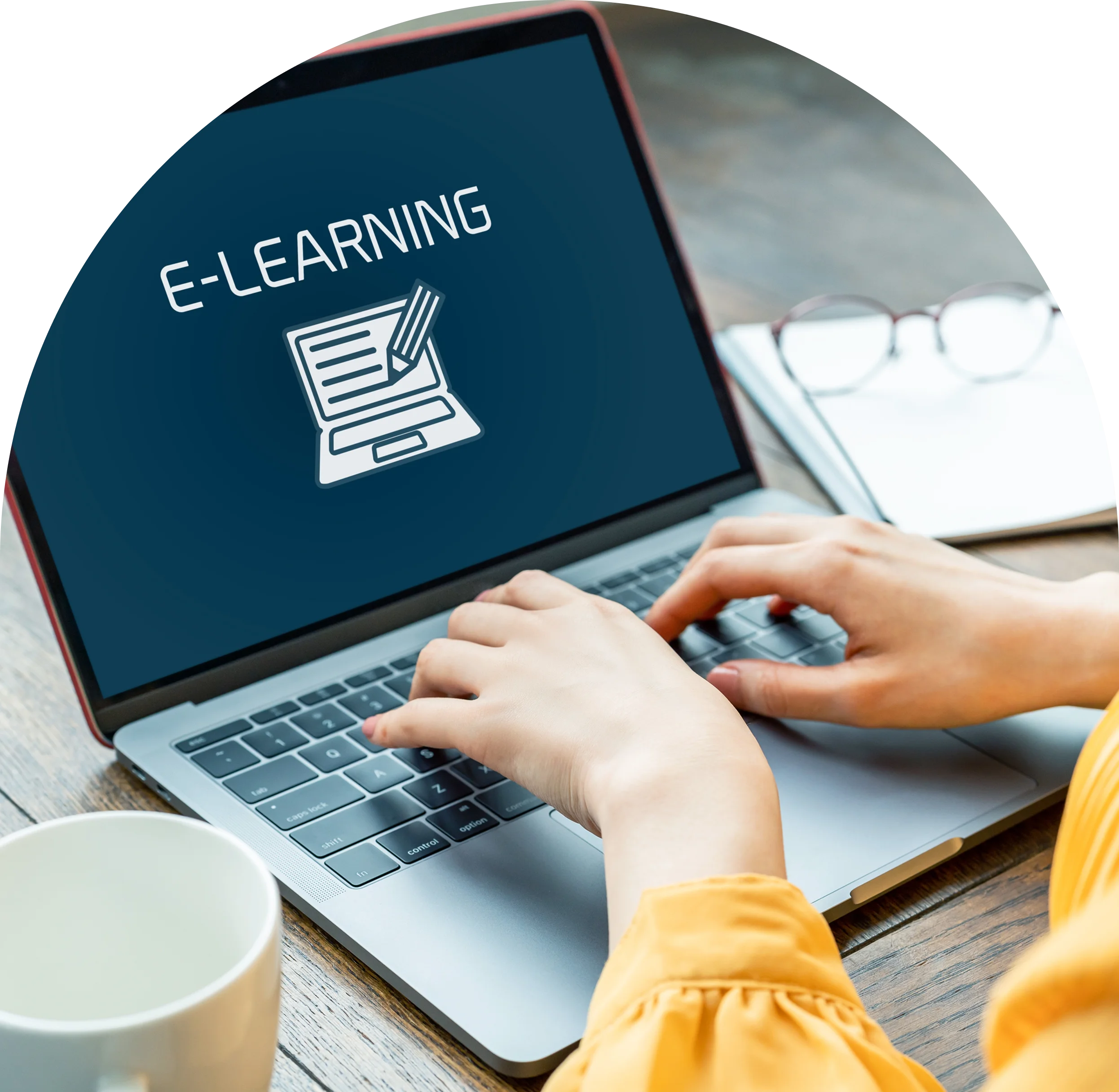 GettyImages-2192762322 (13) Hands typing on laptop with e-learning display.